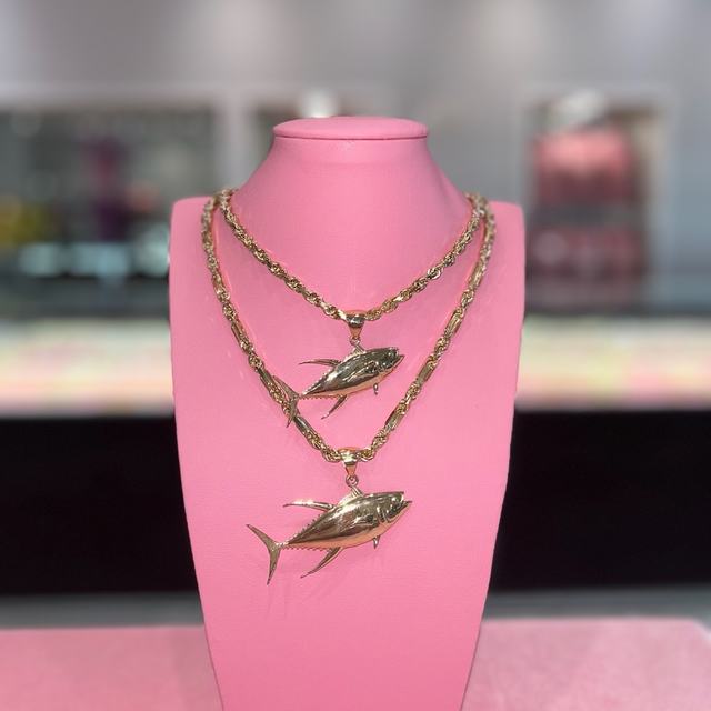 Solid gold ahi tuna pendants on rope chains