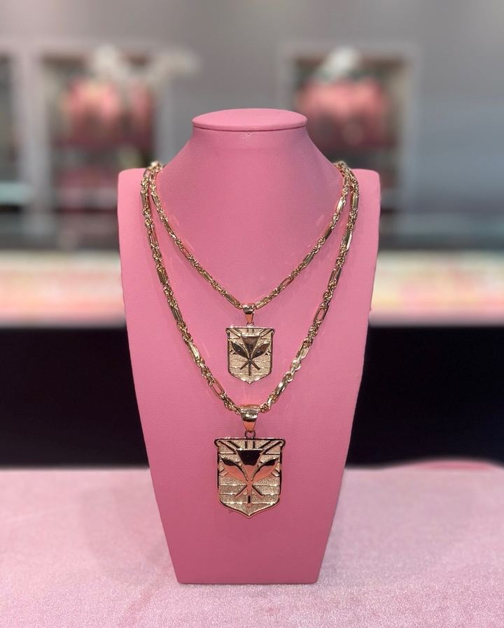 Kanaka Maoli shield pendants on gold chains
